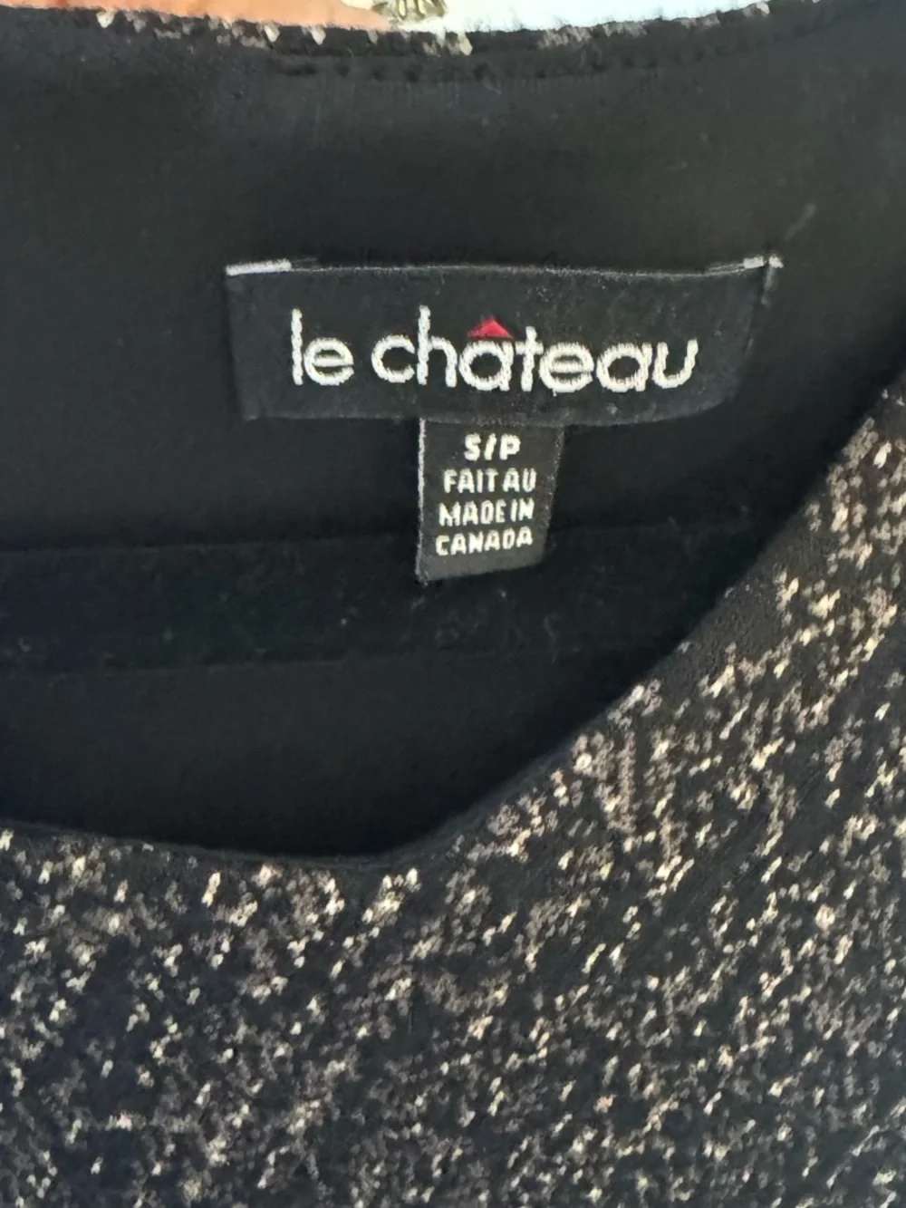 Sleeveless Le Chateau Ponte Knit Sheath Dress with Assymmetrical Neckline - Picture 6 of 7